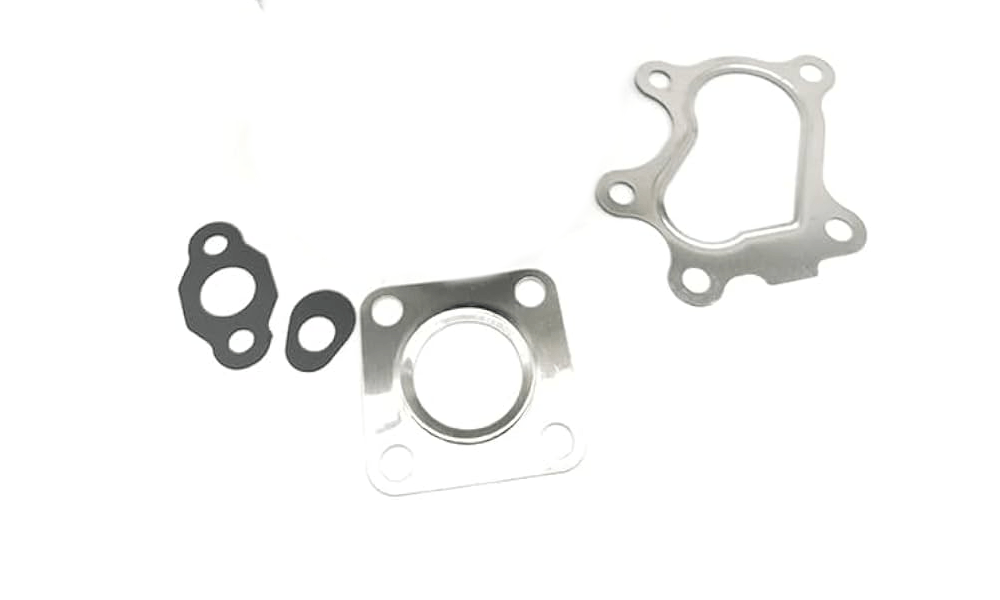 Empaquetadura Turbo AS12 IHI RHF4 NZ870564 New Holland Cat 247 Shibaura